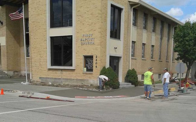 Hand formed concrete curbing