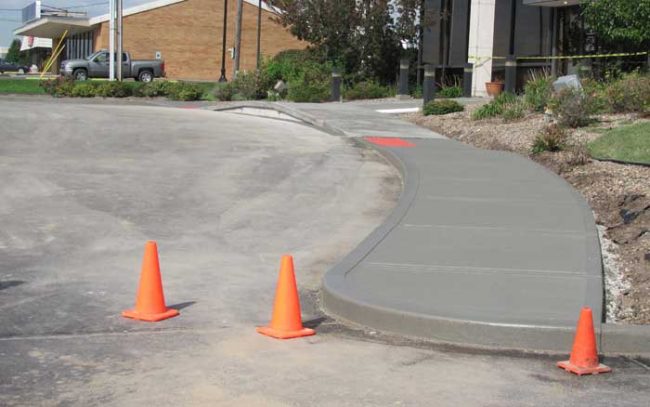 Concrete sidewalk and concrete curbs